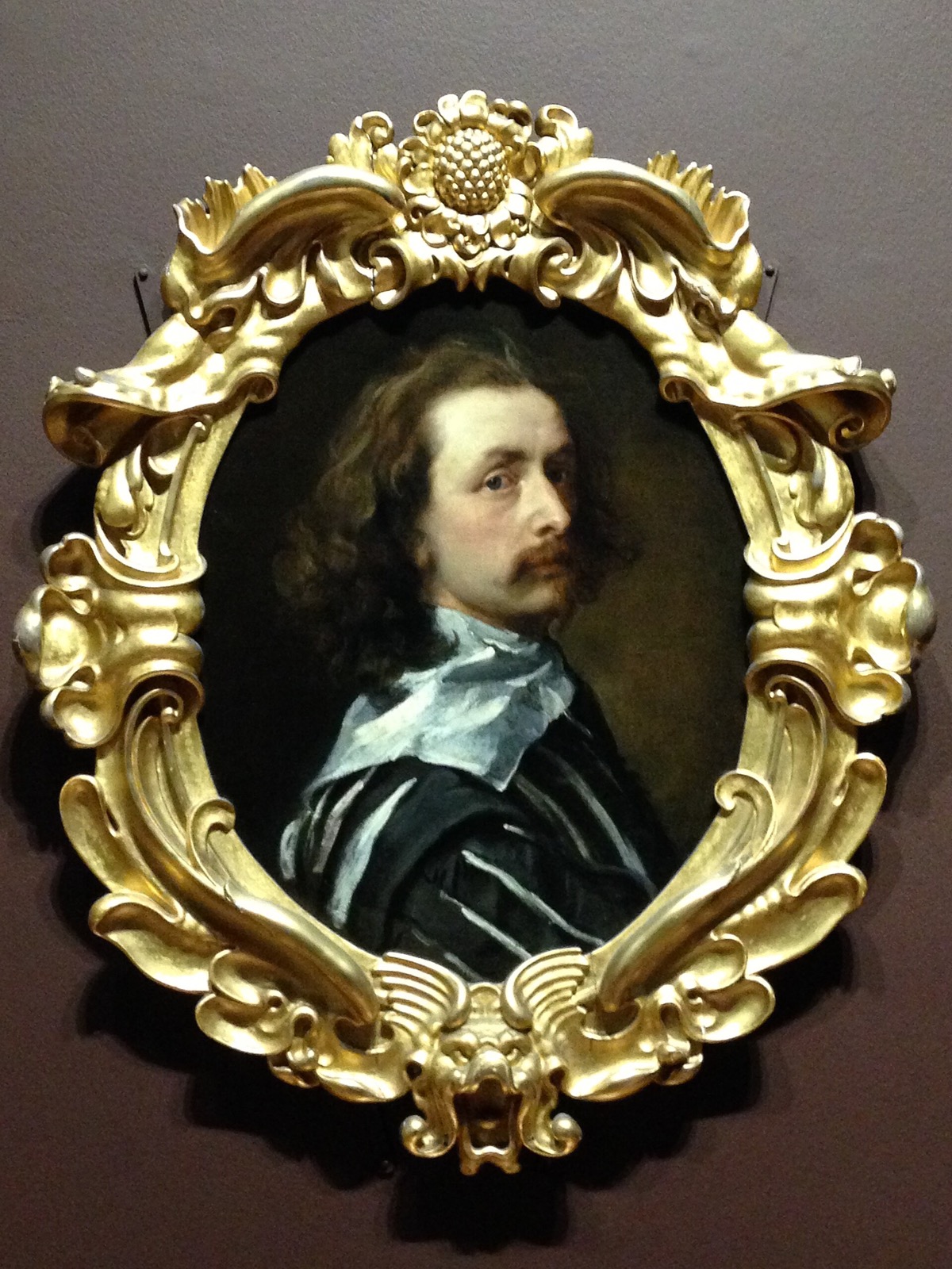 Van Dyck's last self-portrait, in its carved and gilded frame, at the National Portrait Gallery.