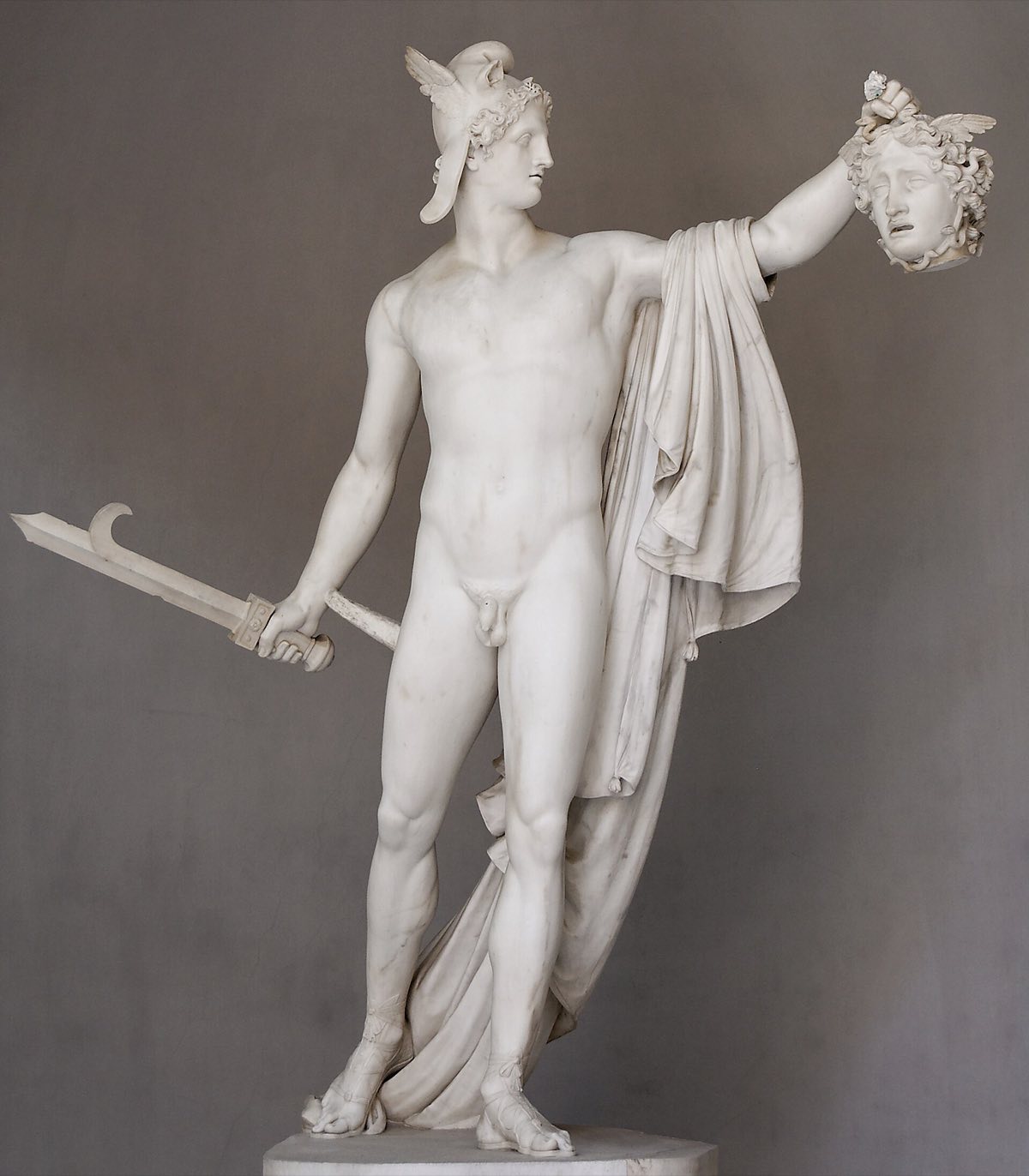 Canova's Perseus in the Vatican Museums, holding up the head of Medusa.
