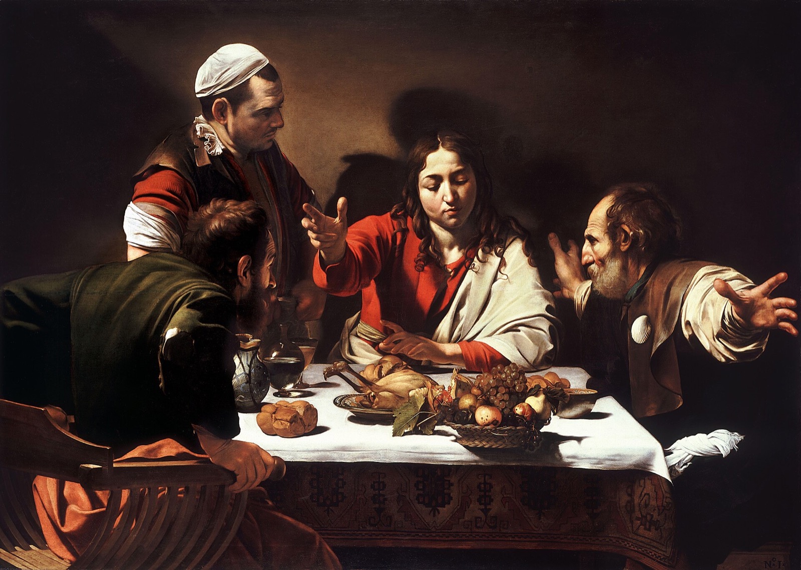 The Supper at Emmaus, by Caravaggio: two disciples start back from the table as they recognise Christ.
