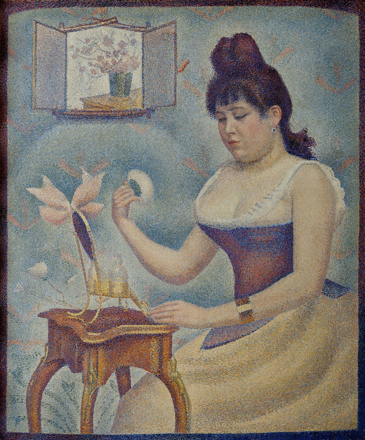 Young Woman Powdering Herself, by Seurat: a woman at a small dressing table, painted in dots.
