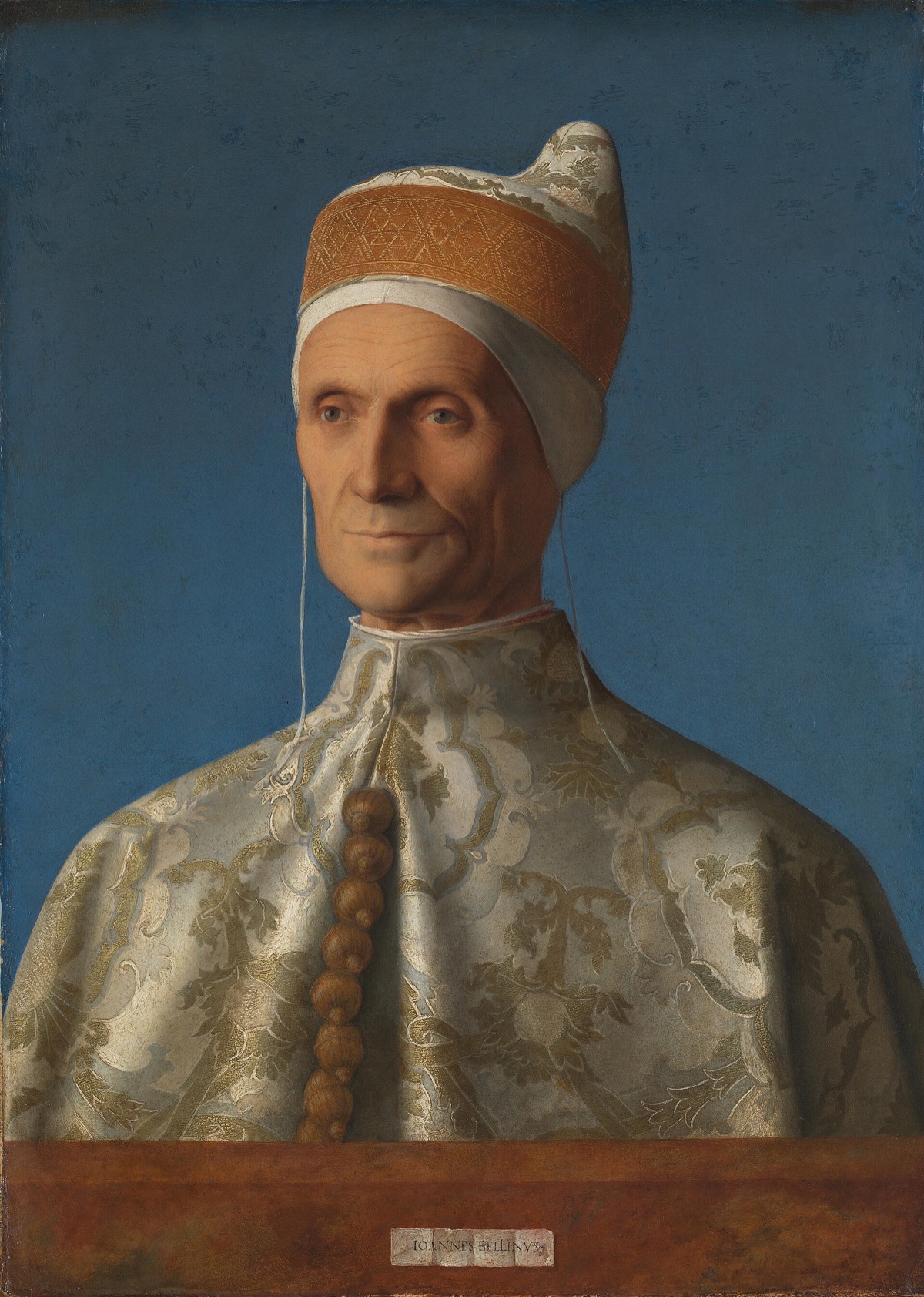 Doge Leonardo Loredan, by Giovanni Bellini: an old man in a robe of white and gold damask and a horned cap, against blue.