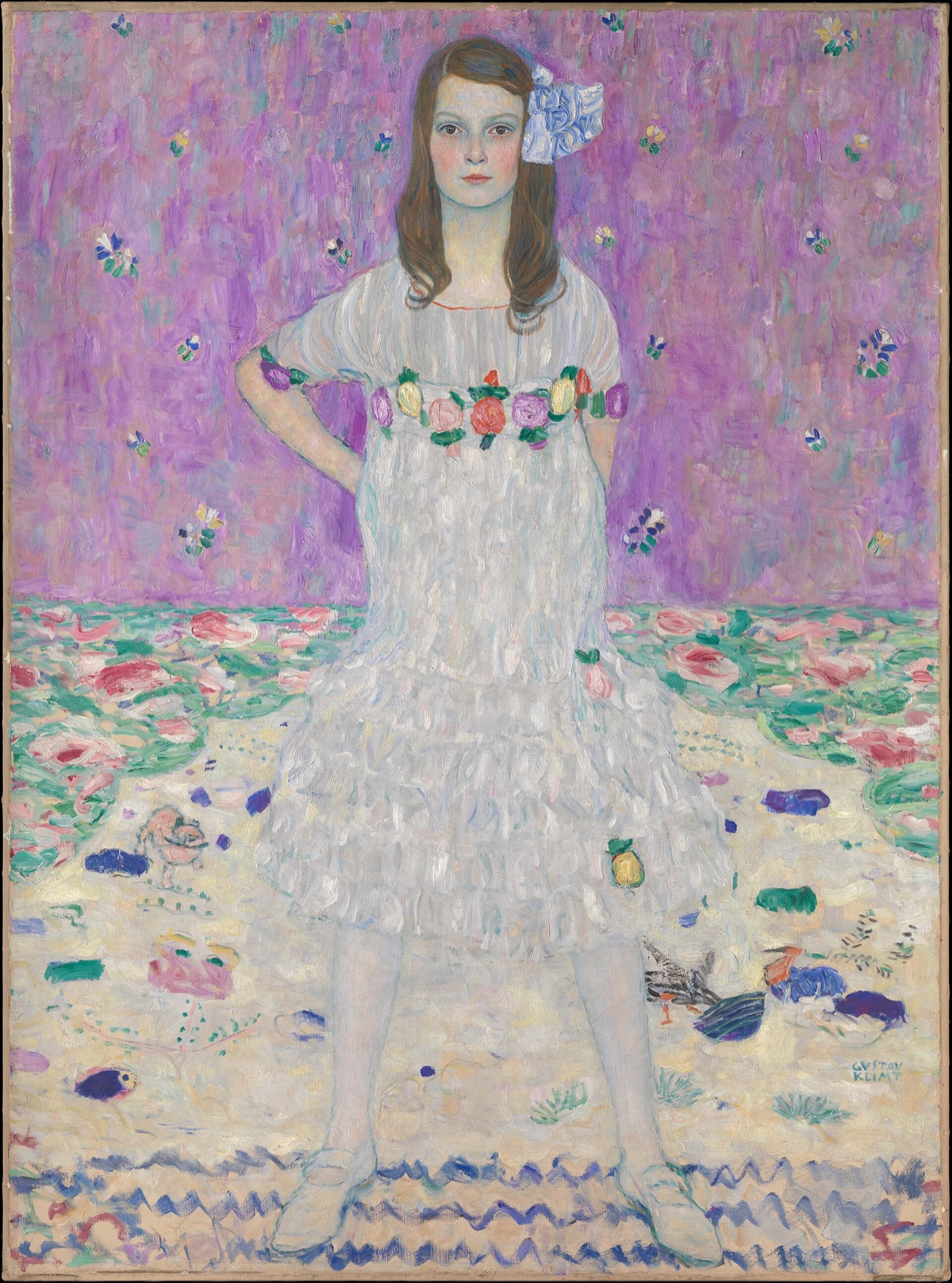 Mäda Primavesi, by Klimt: a girl of nine in a white dress stands with her feet apart and her hands behind her back, against pink and lilac.