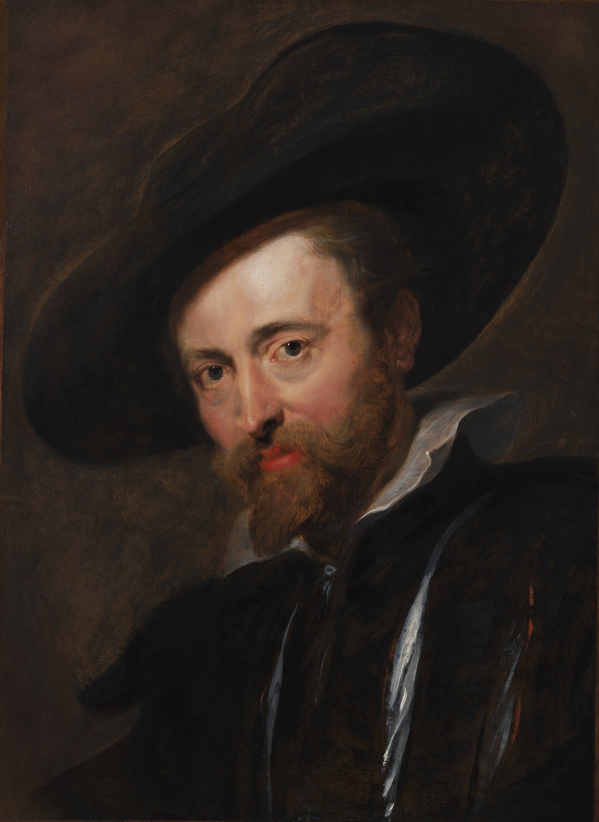 A self-portrait of Rubens in a wide black hat.