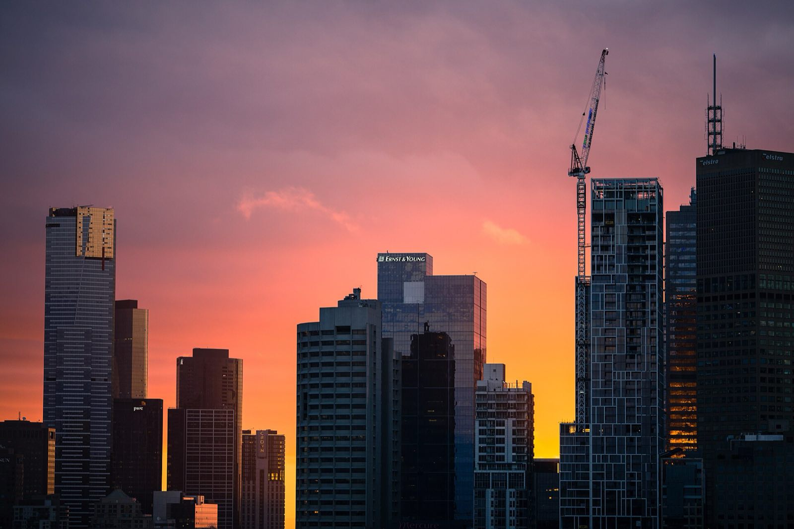 The skyline of Melbourne at sunset.