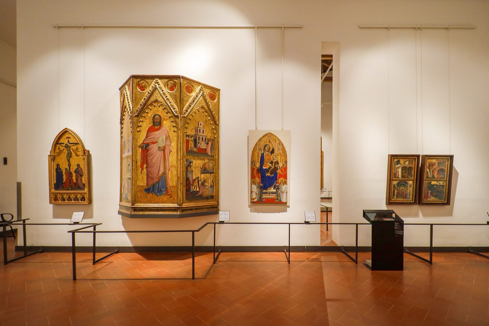 A room of the Uffizi hung with gold-ground paintings of the fourteenth century.