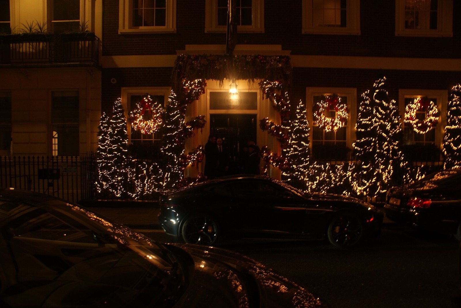 The front of Brown's Hotel hung with lights at Christmas.
