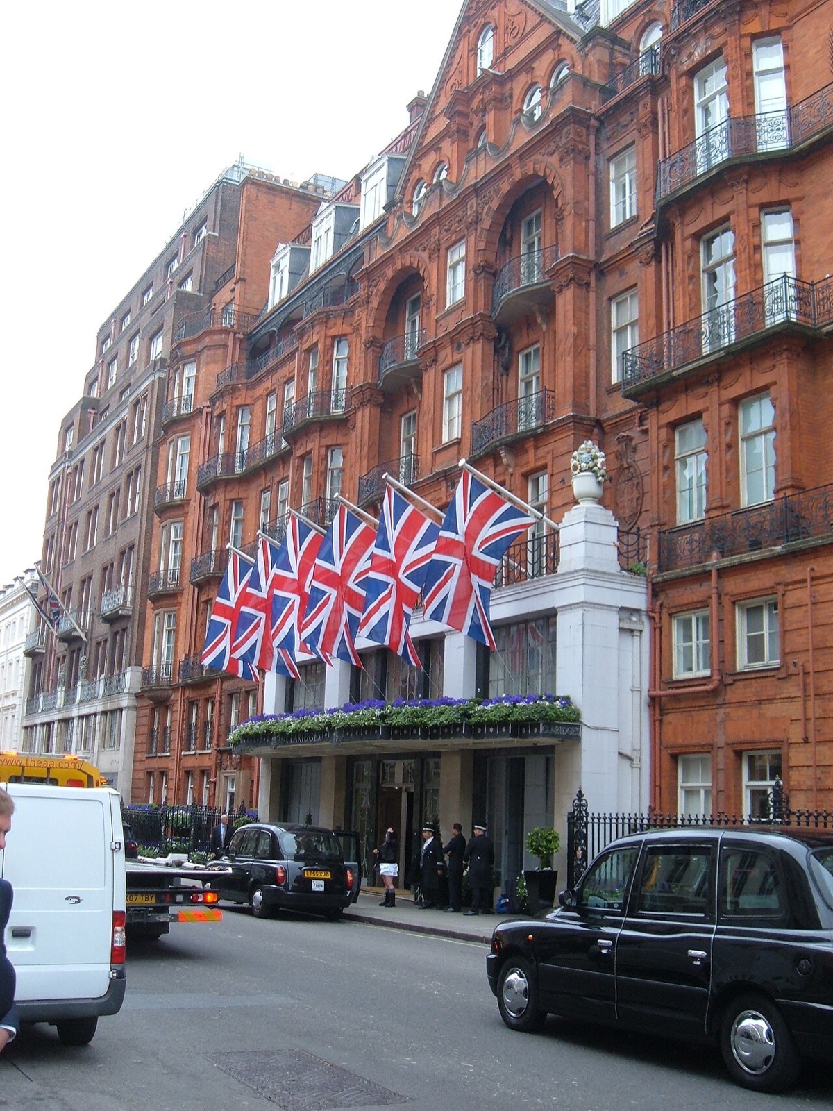 Claridge's on Brook Street, a red-brick hotel with flags flying over the entrance.