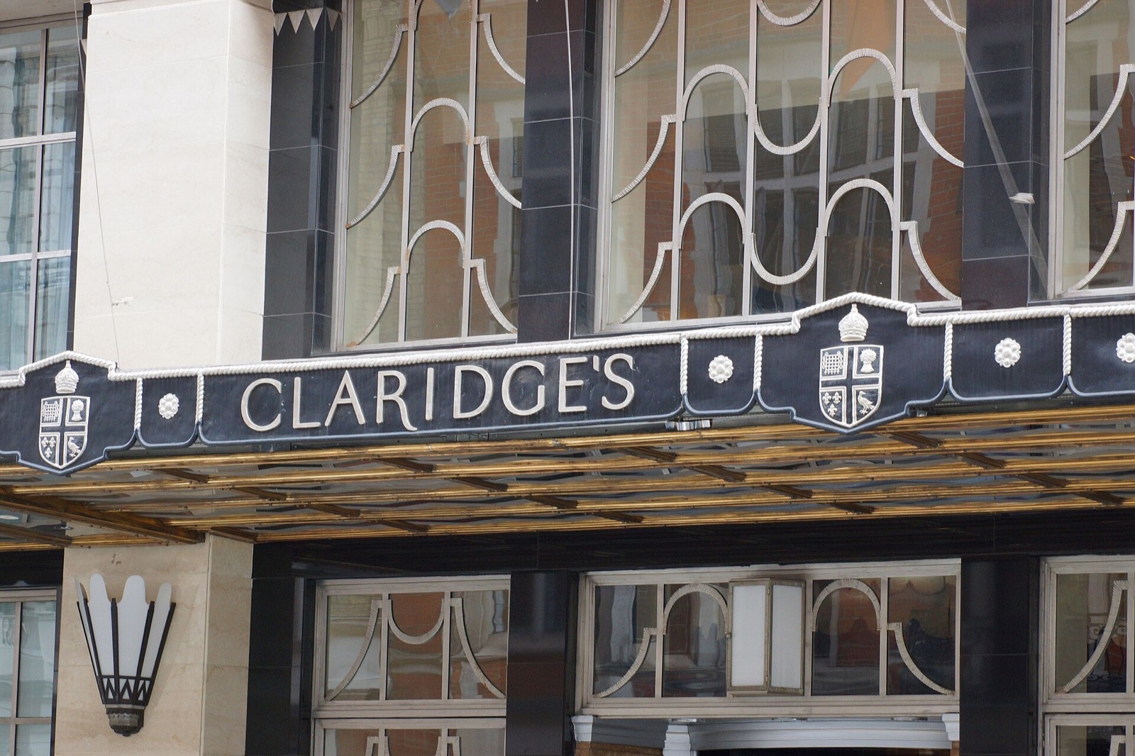 The Art Deco canopy of Claridge's, with the hotel's name in metal letters.