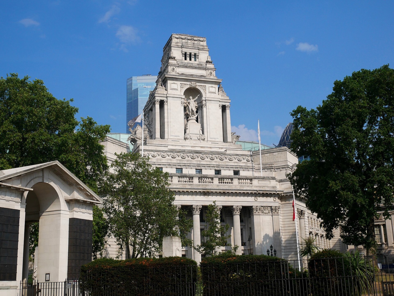 Ten Trinity Square seen from Tower Hill, a stone palace with a columned tower above its portico.