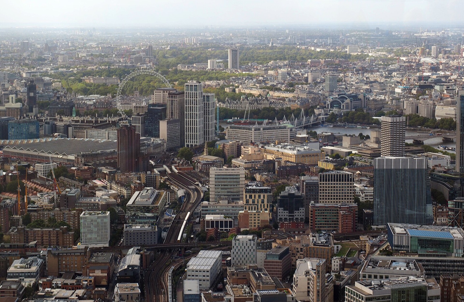 London from high in The Shard, looking west along the Thames to the London Eye.