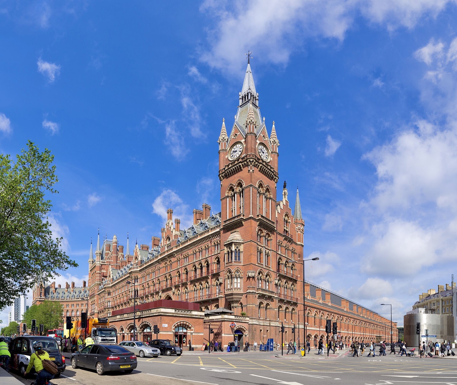 The St Pancras hotel on Euston Road, a Gothic palace of red brick with a clock tower and spires.