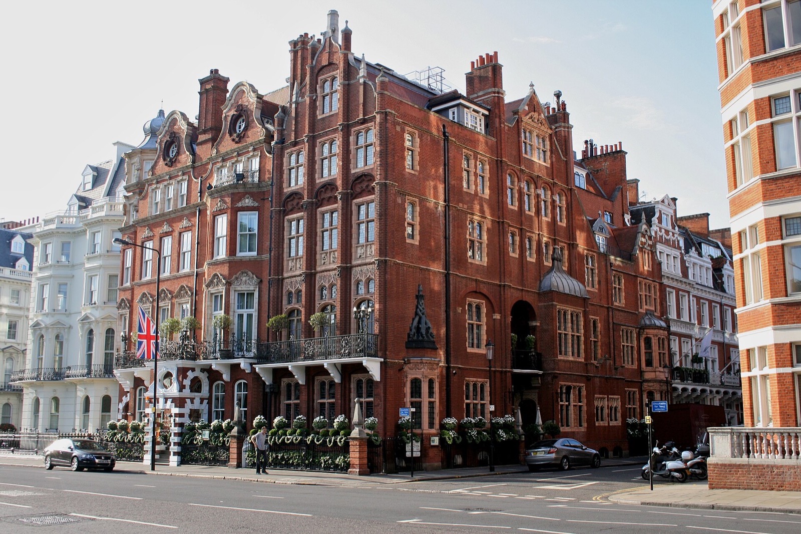The Milestone Hotel in Kensington, two Victorian mansions of red brick with gables and bay windows.