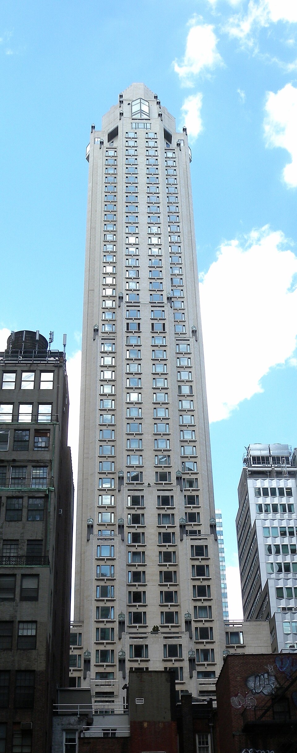 The stepped limestone tower of the Four Seasons Hotel New York.