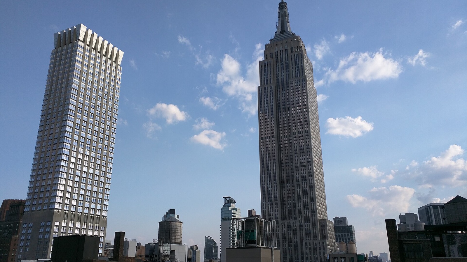 The tower at 400 Fifth Avenue, which holds the Langham, beside the Empire State Building.