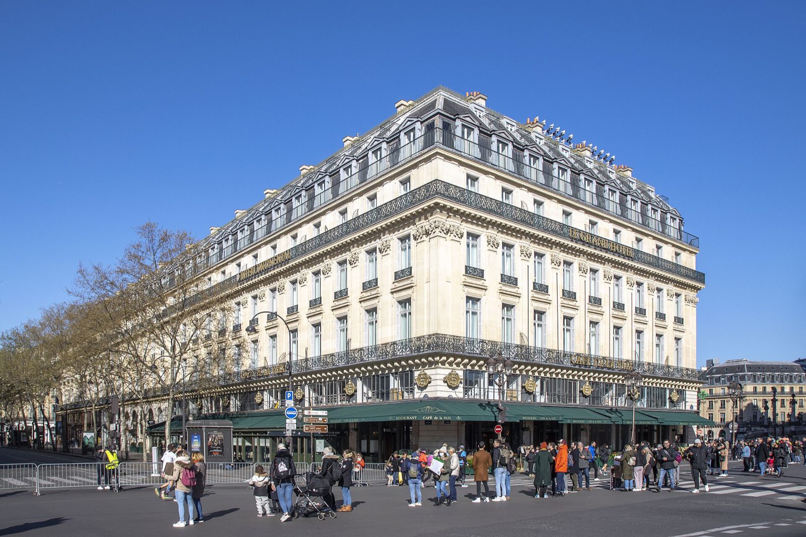 The InterContinental Paris Le Grand on the Place de l'Opéra, with the green awnings of the Café de la Paix along the pavement.