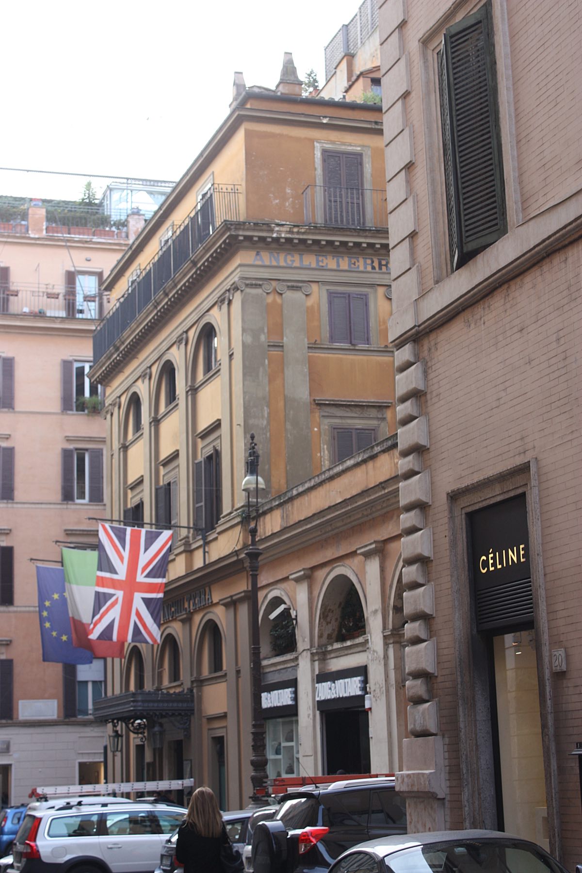 Via Bocca di Leone, with the Hotel d'Inghilterra and a British flag over its door.