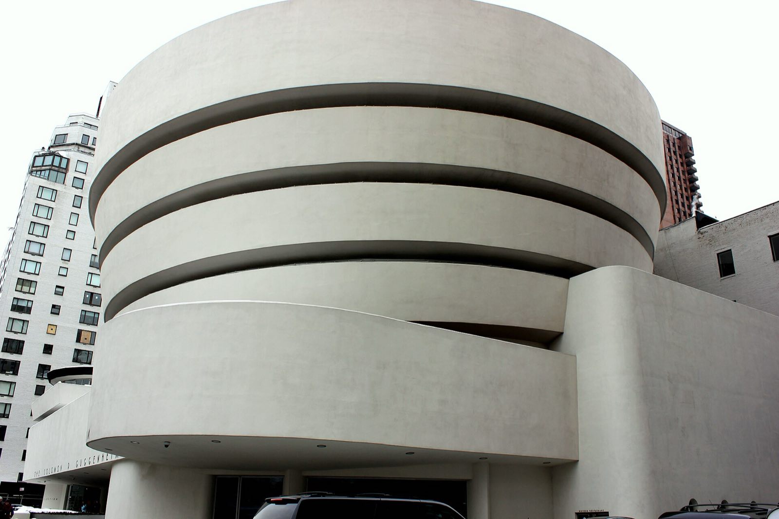 The white spiral of the Guggenheim Museum in New York, seen from the street.