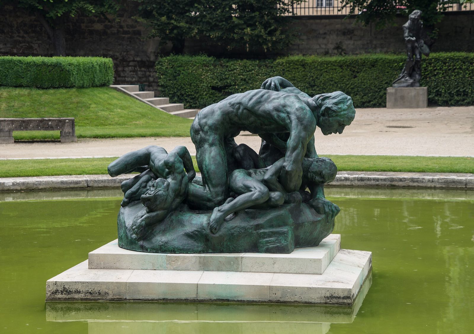 A bronze sculpture group by Rodin in the garden of the Musée Rodin.
