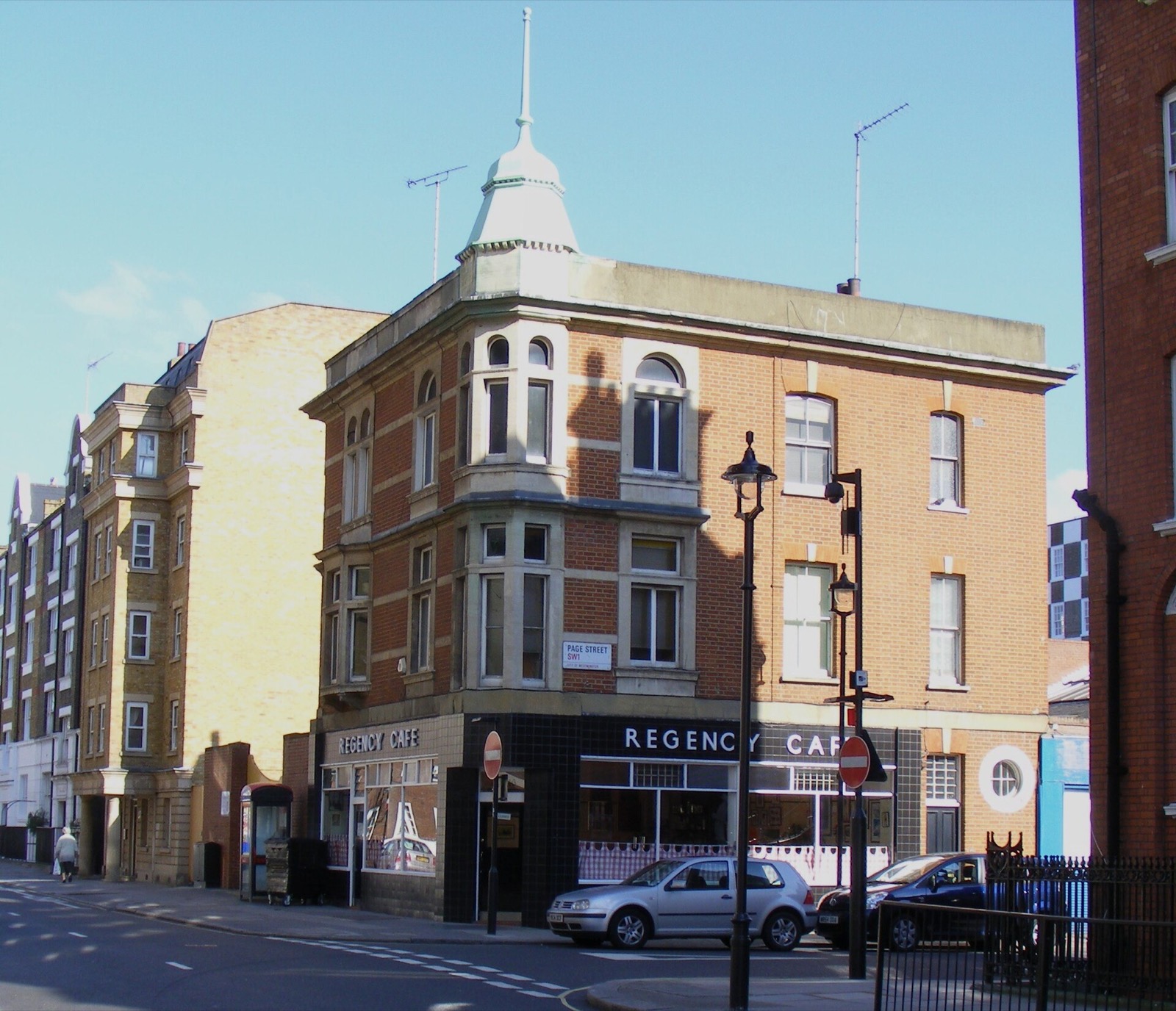 The corner of Regency Street in Westminster, with the Regency Cafe on the ground floor.