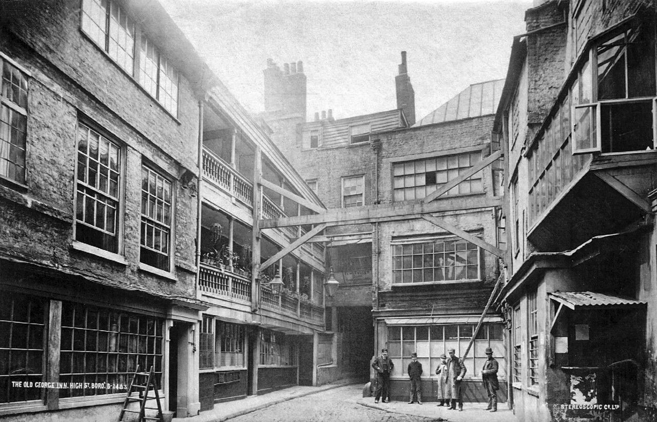 The George Inn in 1889, when the galleries ran round three sides of the yard, in a photograph of the time.
