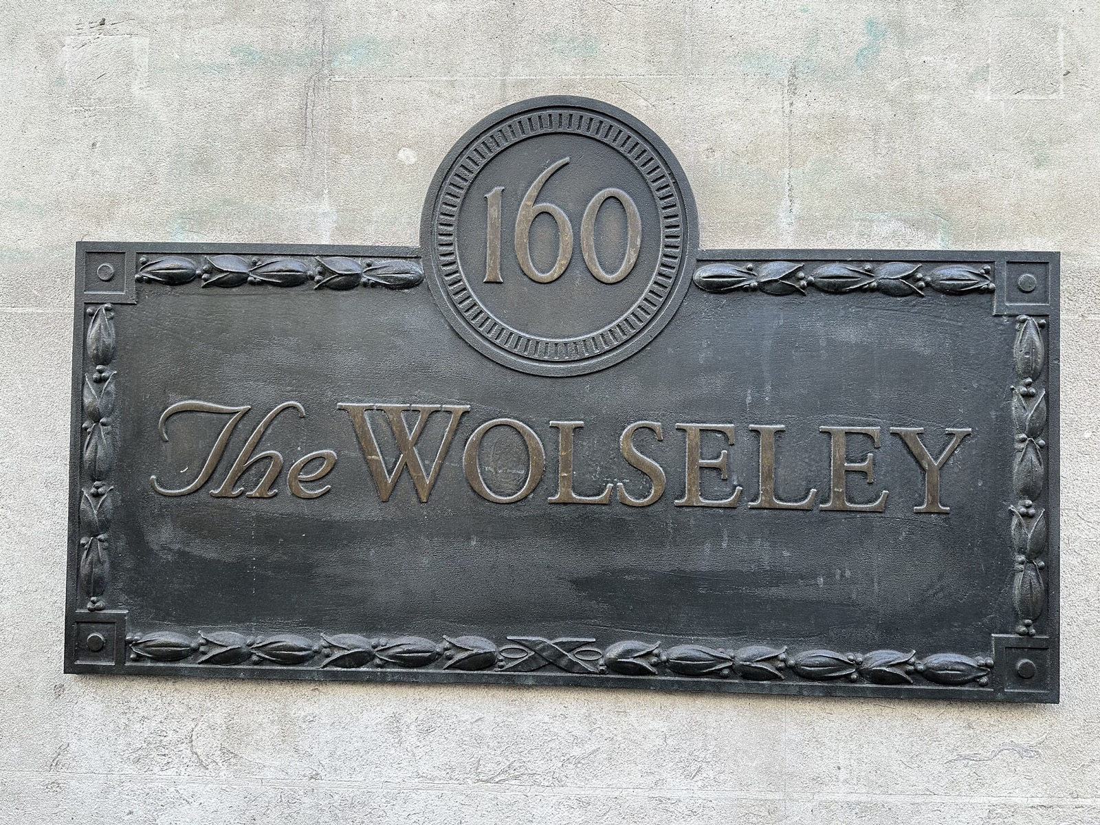 The bronze plate of The Wolseley at 160 Piccadilly.