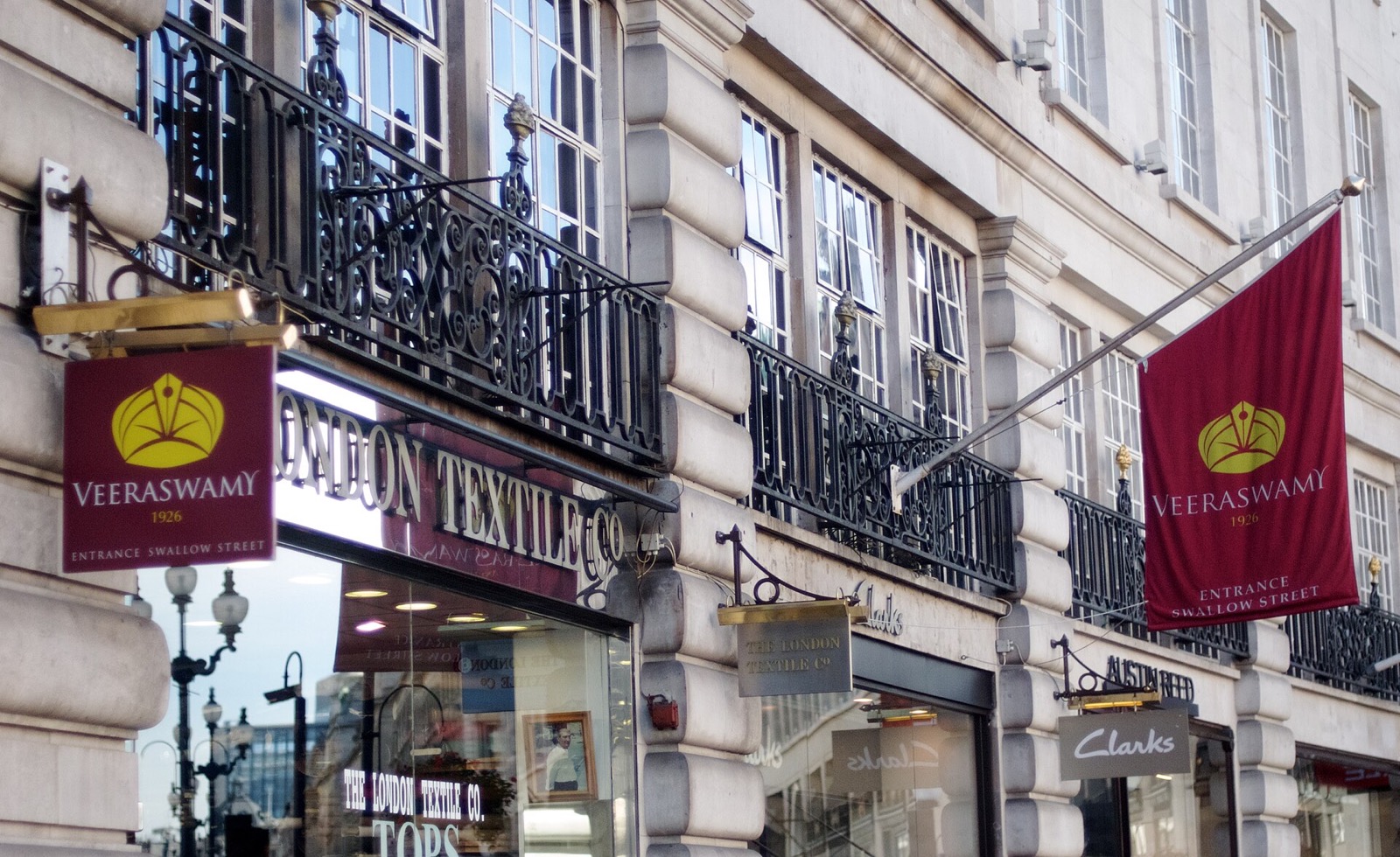 The first-floor windows and banners of Veeraswamy above Regent Street.