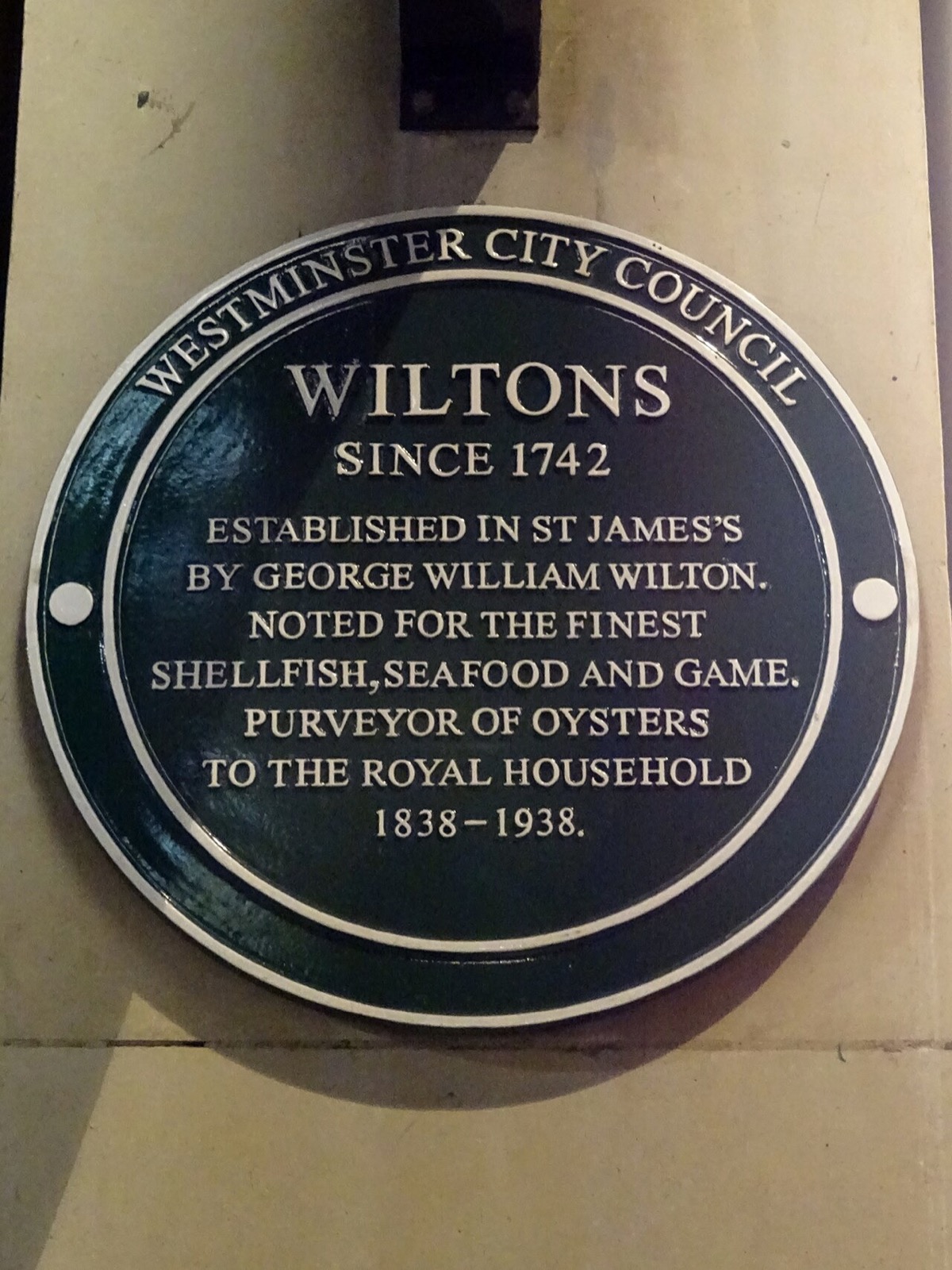 The green plaque of Wiltons: established in 1742 by George William Wilton, noted for oysters and game.