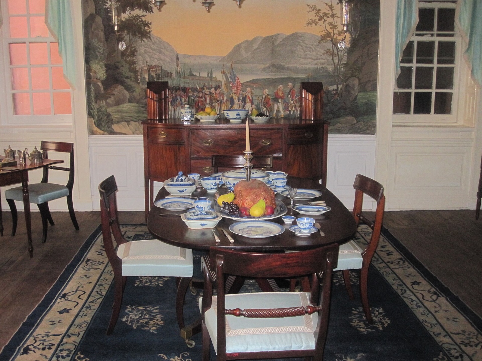 The Clinton Room at Fraunces Tavern, a dining room hung with old scenic wallpaper.