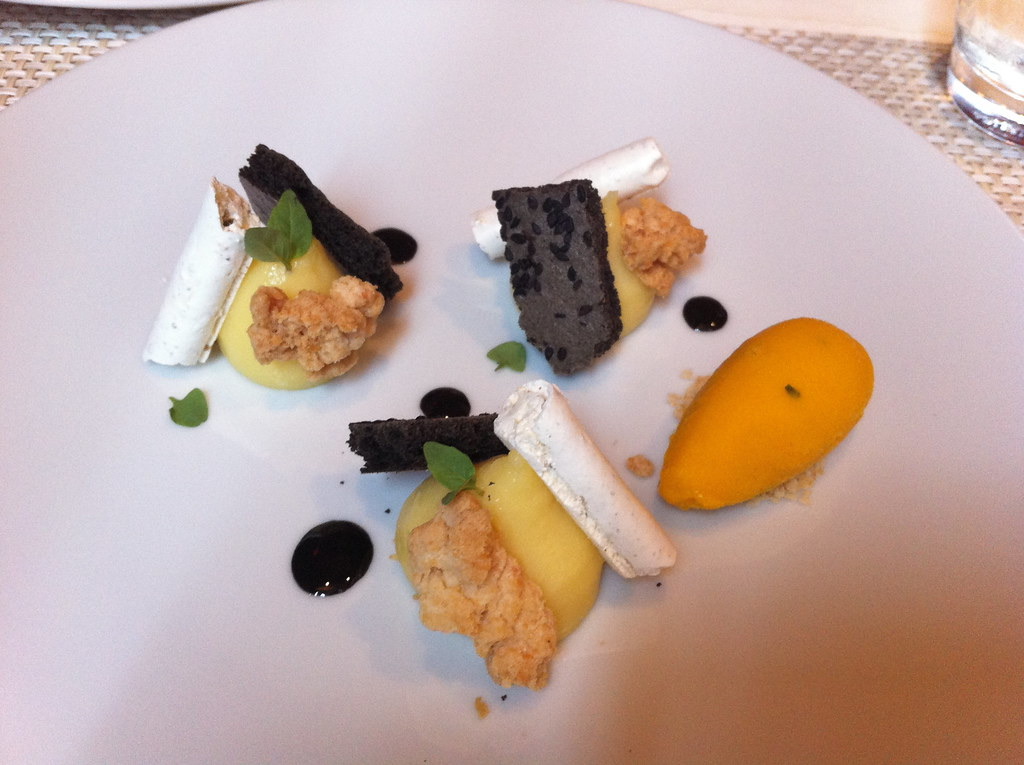 A dessert of yuzu, meringue and black sesame at Le Bernardin.