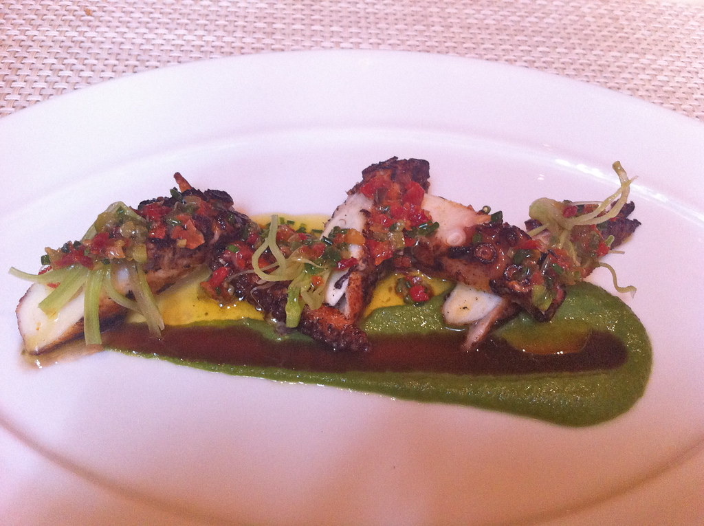 Charred octopus on a green sauce at Le Bernardin.