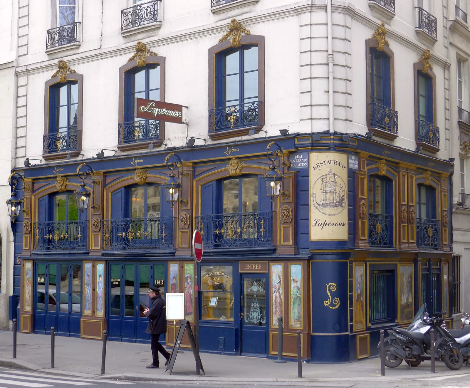 The dark blue and gold front of Lapérouse on the quai des Grands-Augustins.
