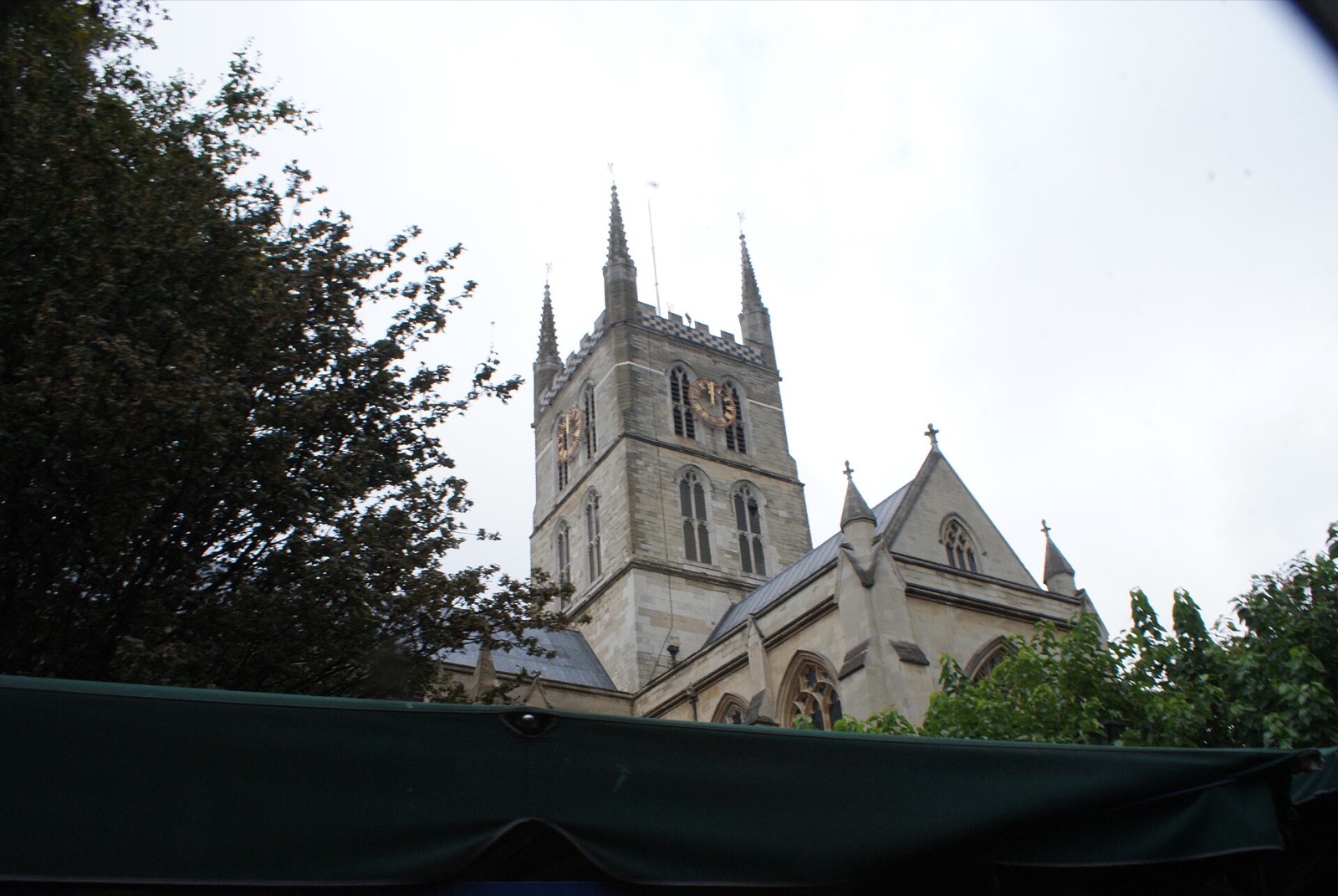 The tower of Southwark Cathedral seen from Borough Market.