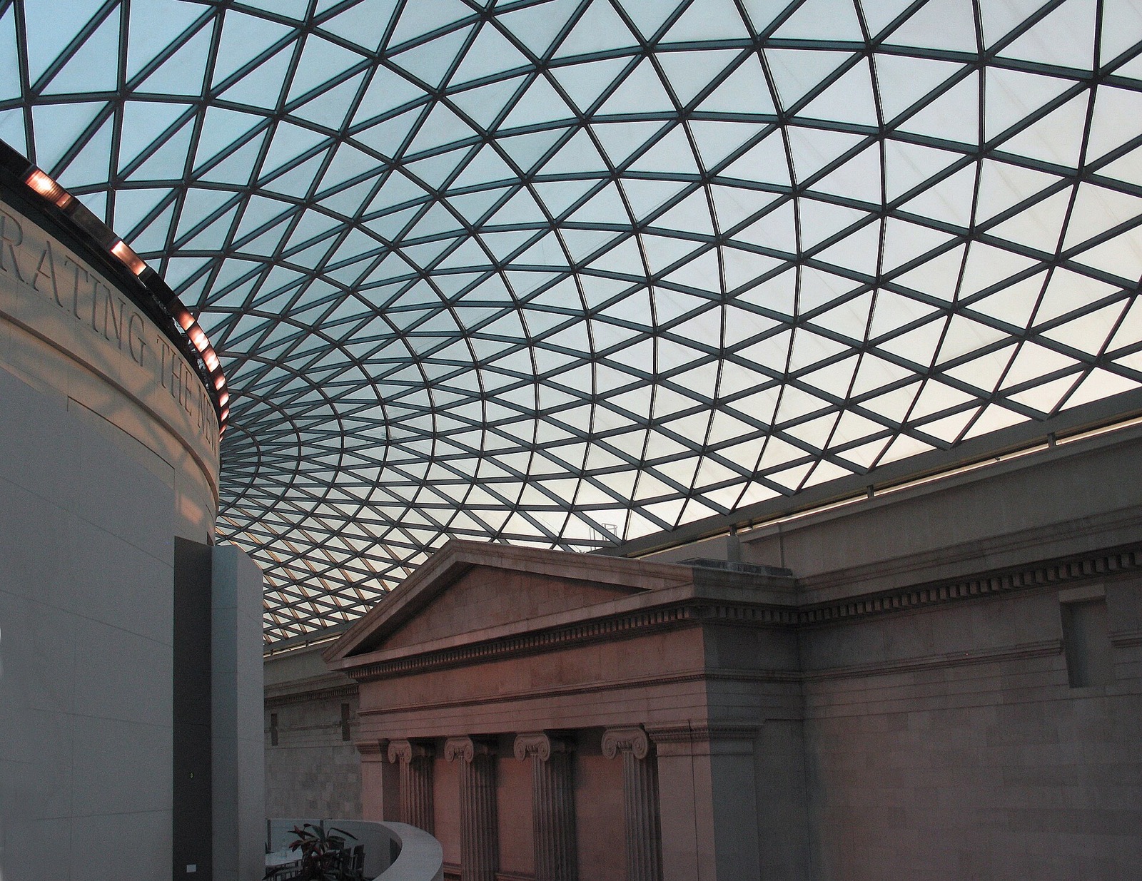 The Great Court of the British Museum, its glass and steel roof curving over the round Reading Room.