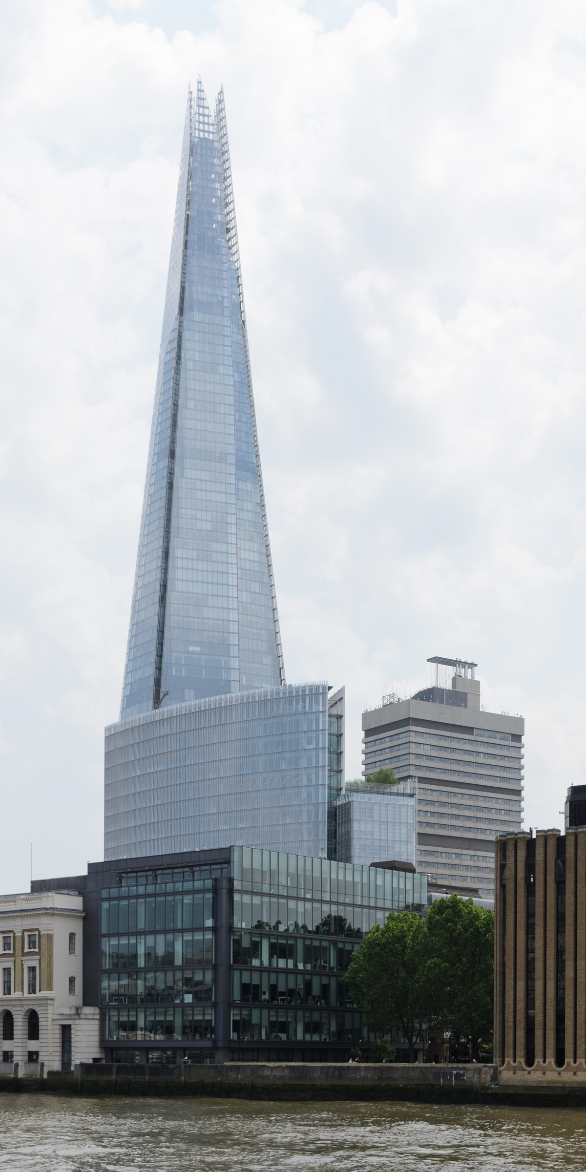The Shard, a tapering tower of glass that ends in open splinters, above the roofs of Southwark.
