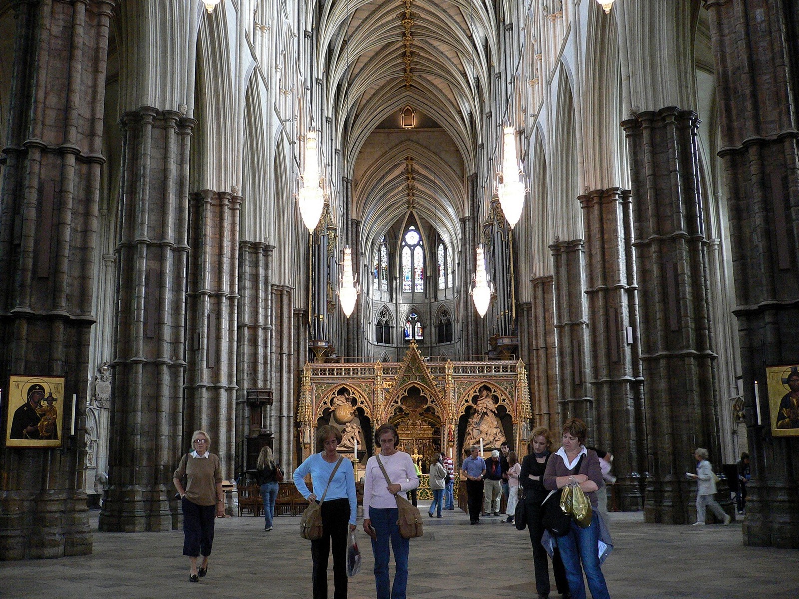 The nave of Westminster Abbey, looking east under the Gothic vault to the gilded screen of the quire.