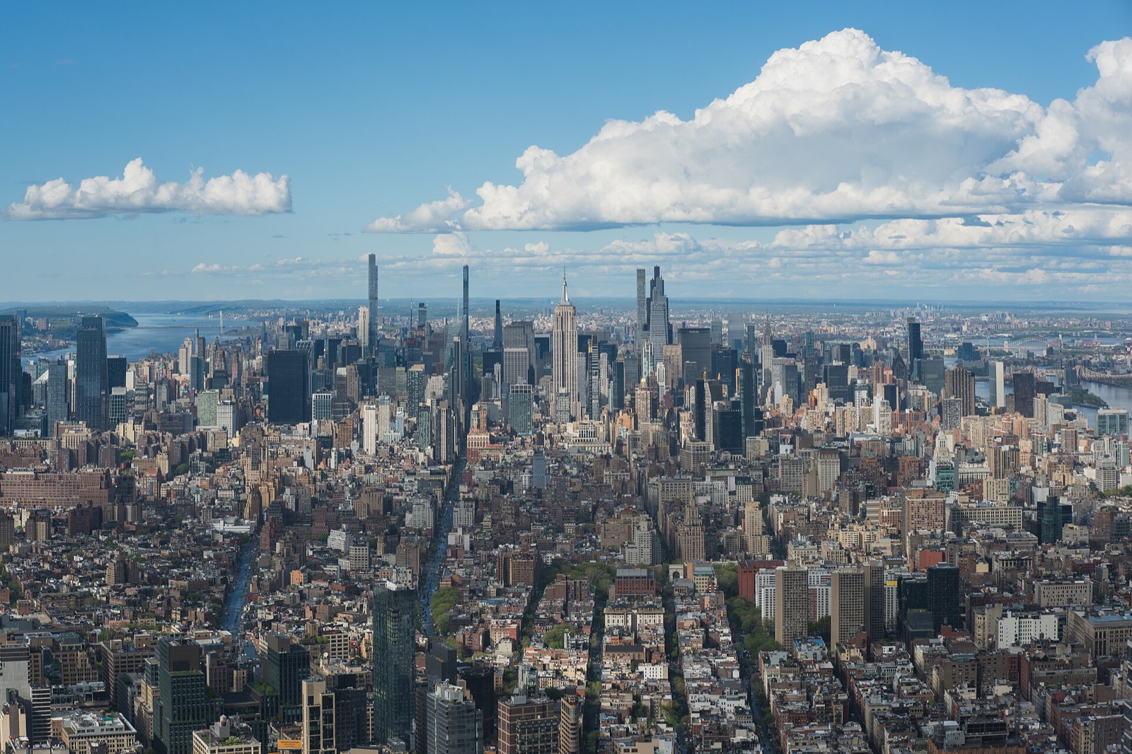 Manhattan seen from One World Observatory, the streets running north to the towers of Midtown.
