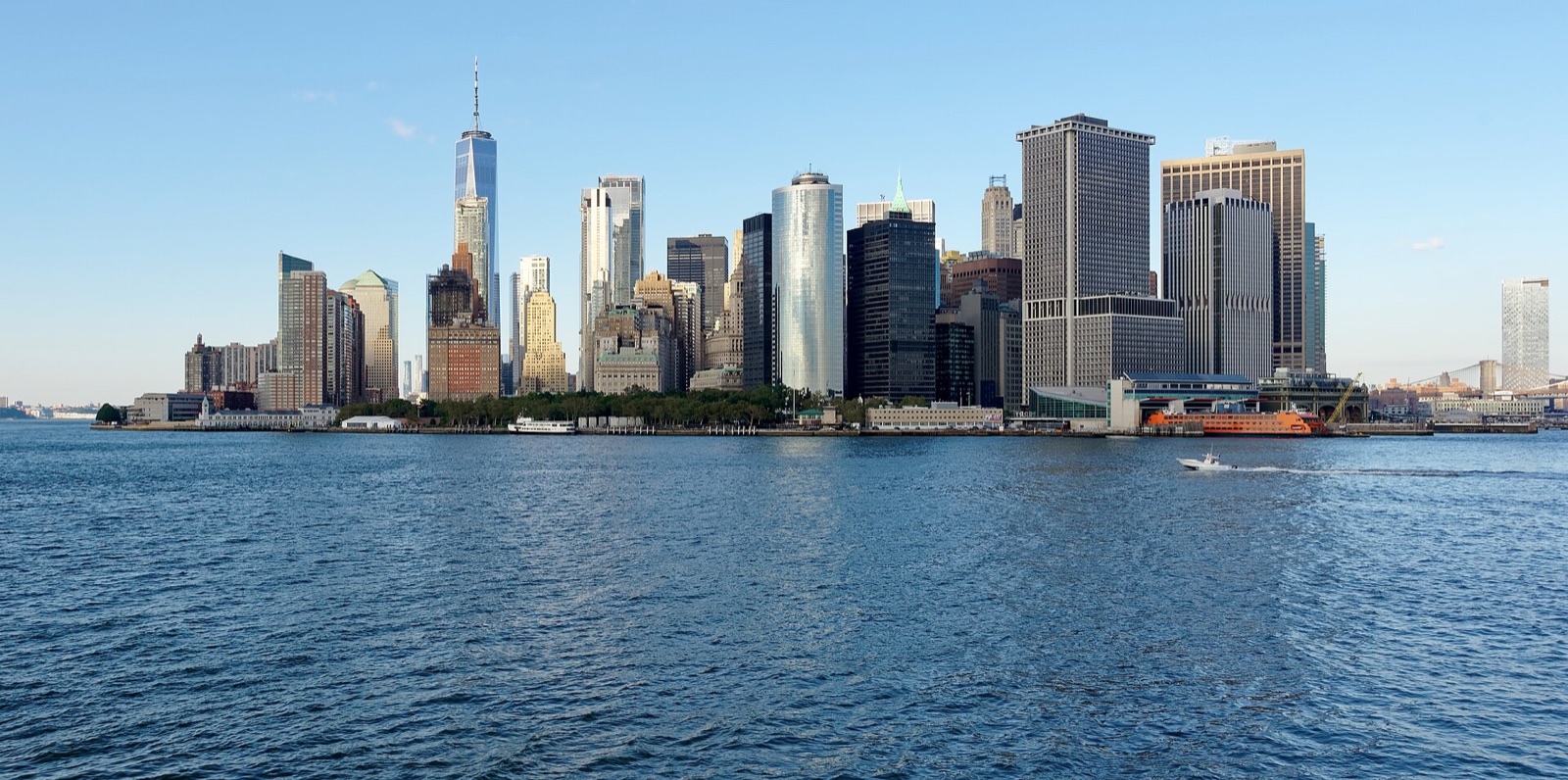 The towers of Lower Manhattan rising from the water, seen from the Staten Island Ferry.