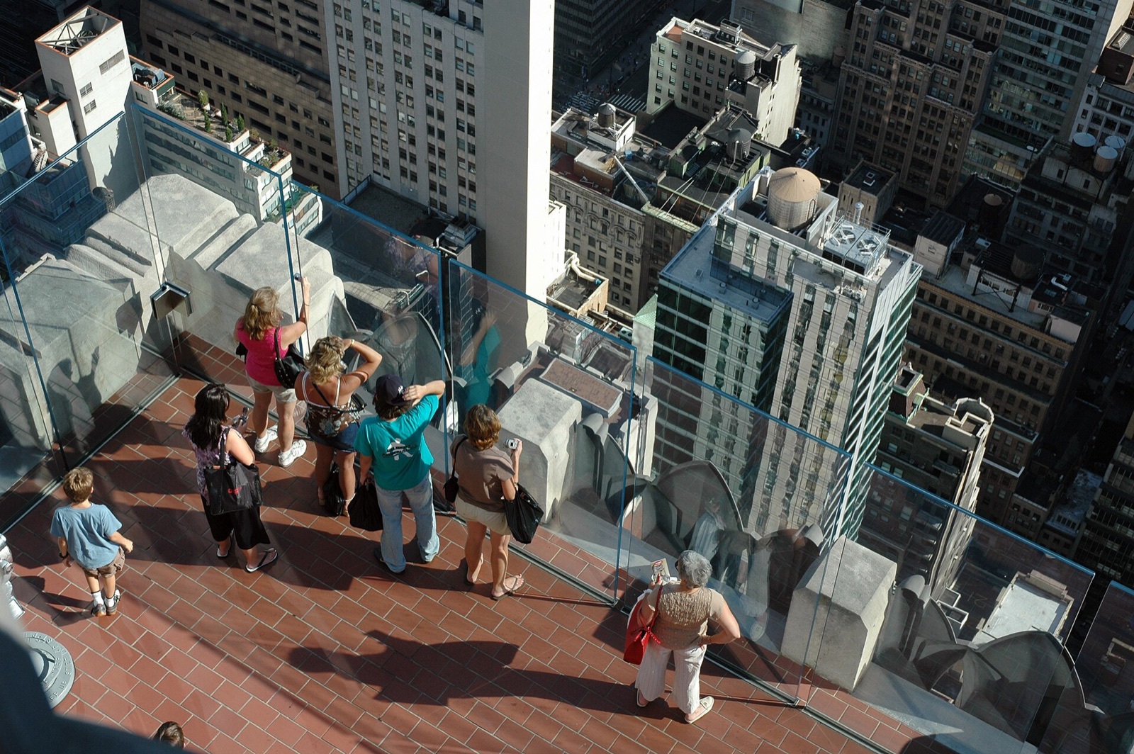 Visitors on one of the terraces of Top of the Rock, seen from the level above.
