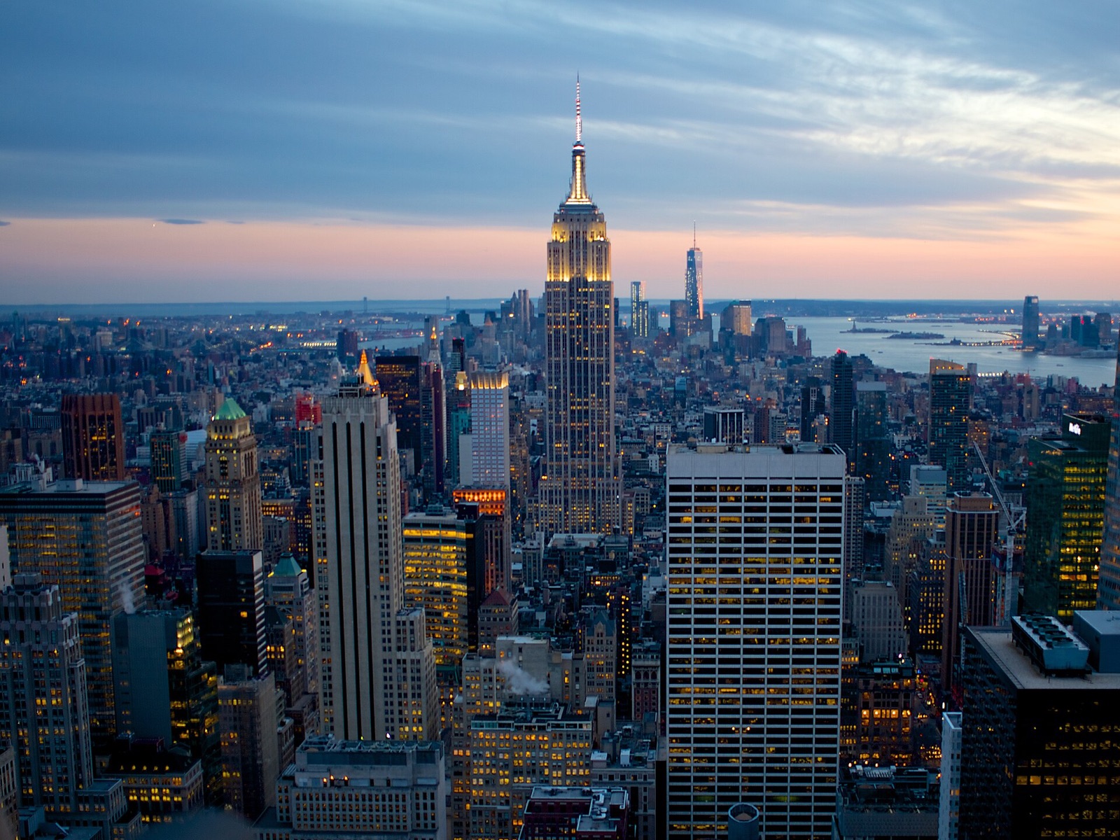 The Empire State Building and the towers of Lower Manhattan at dusk, seen from Top of the Rock.