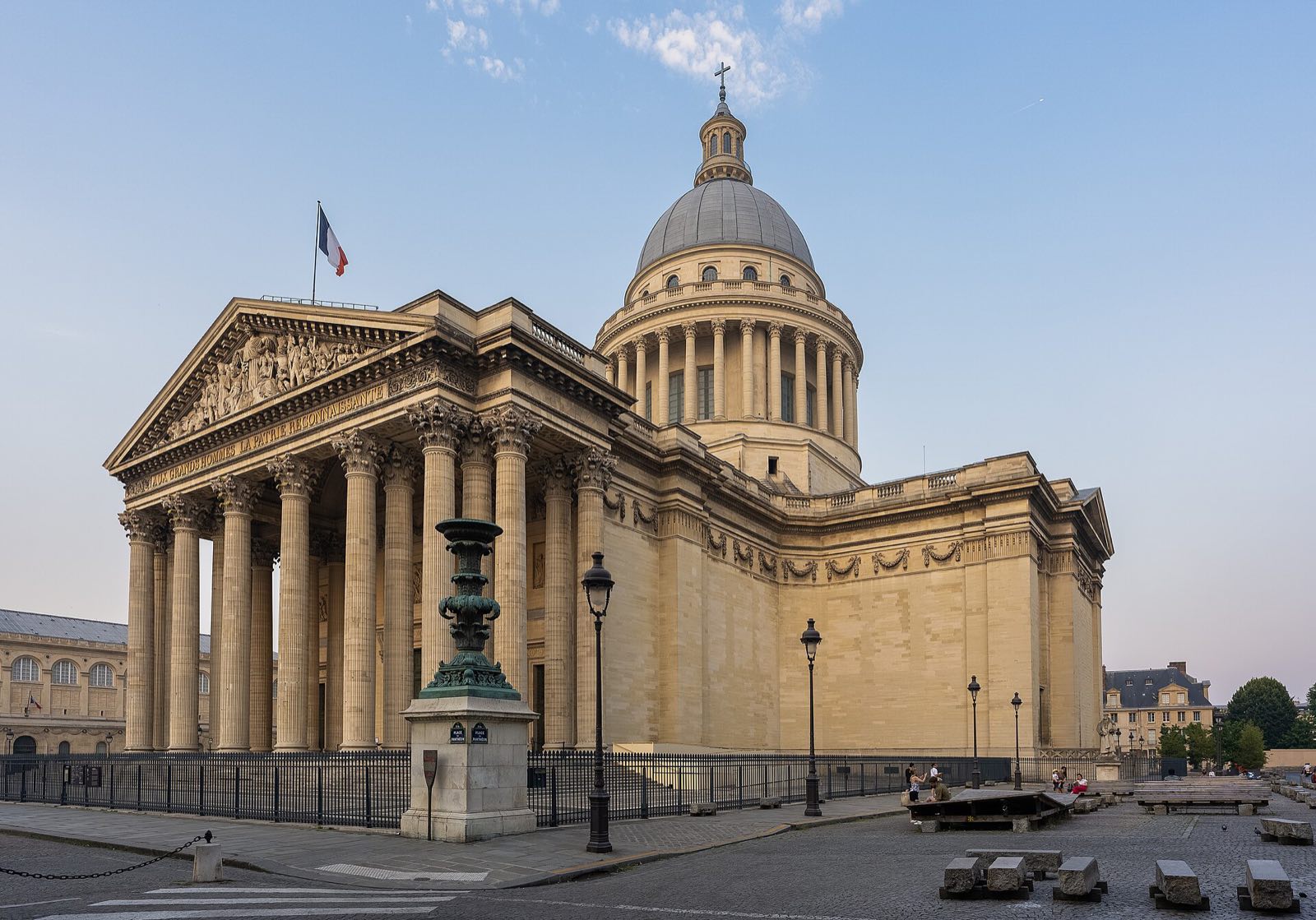 The Panthéon seen from the square in front of it, its columns and dome in evening light.