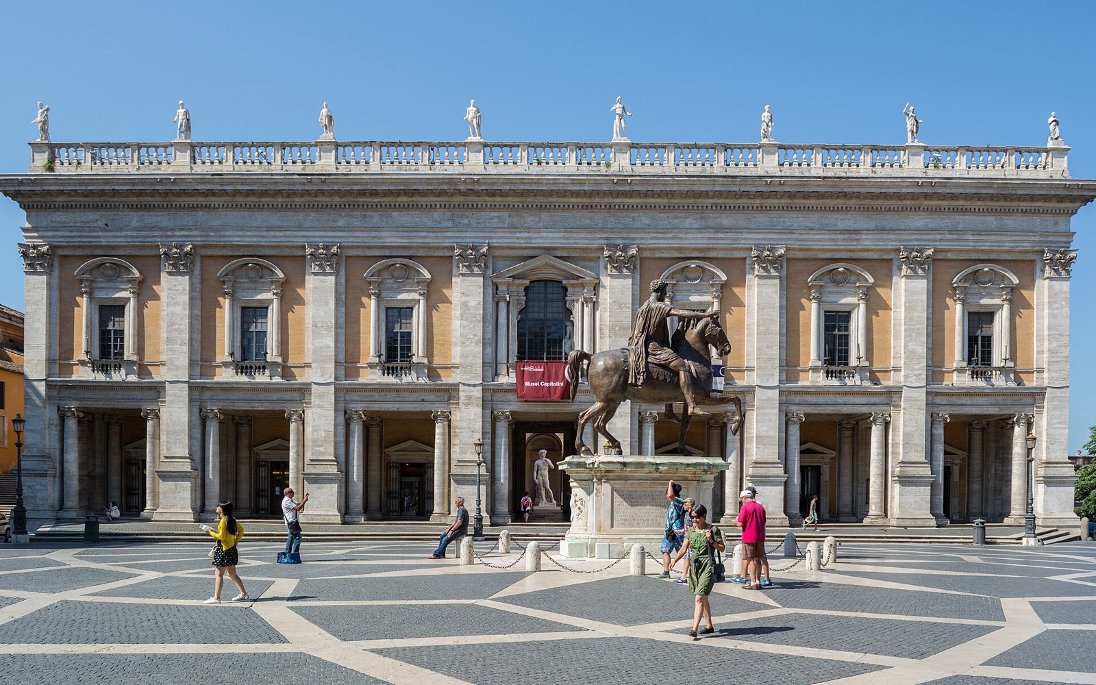 The Piazza del Campidoglio with its patterned paving, the statue of Marcus Aurelius and a palace of the Capitoline Museums.