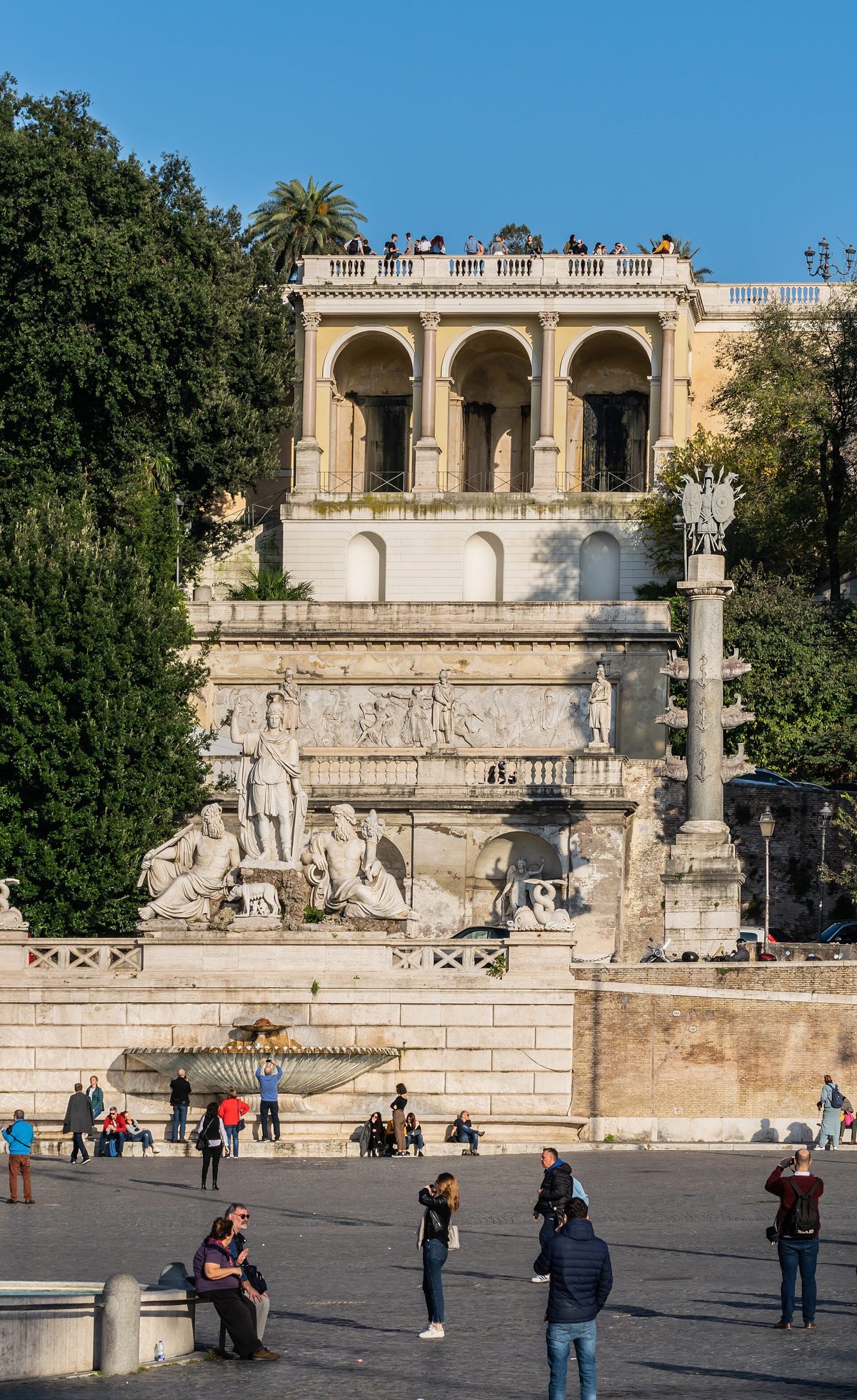 The terrace of the Pincio seen from Piazza del Popolo below, with its ramps, columns and statues.